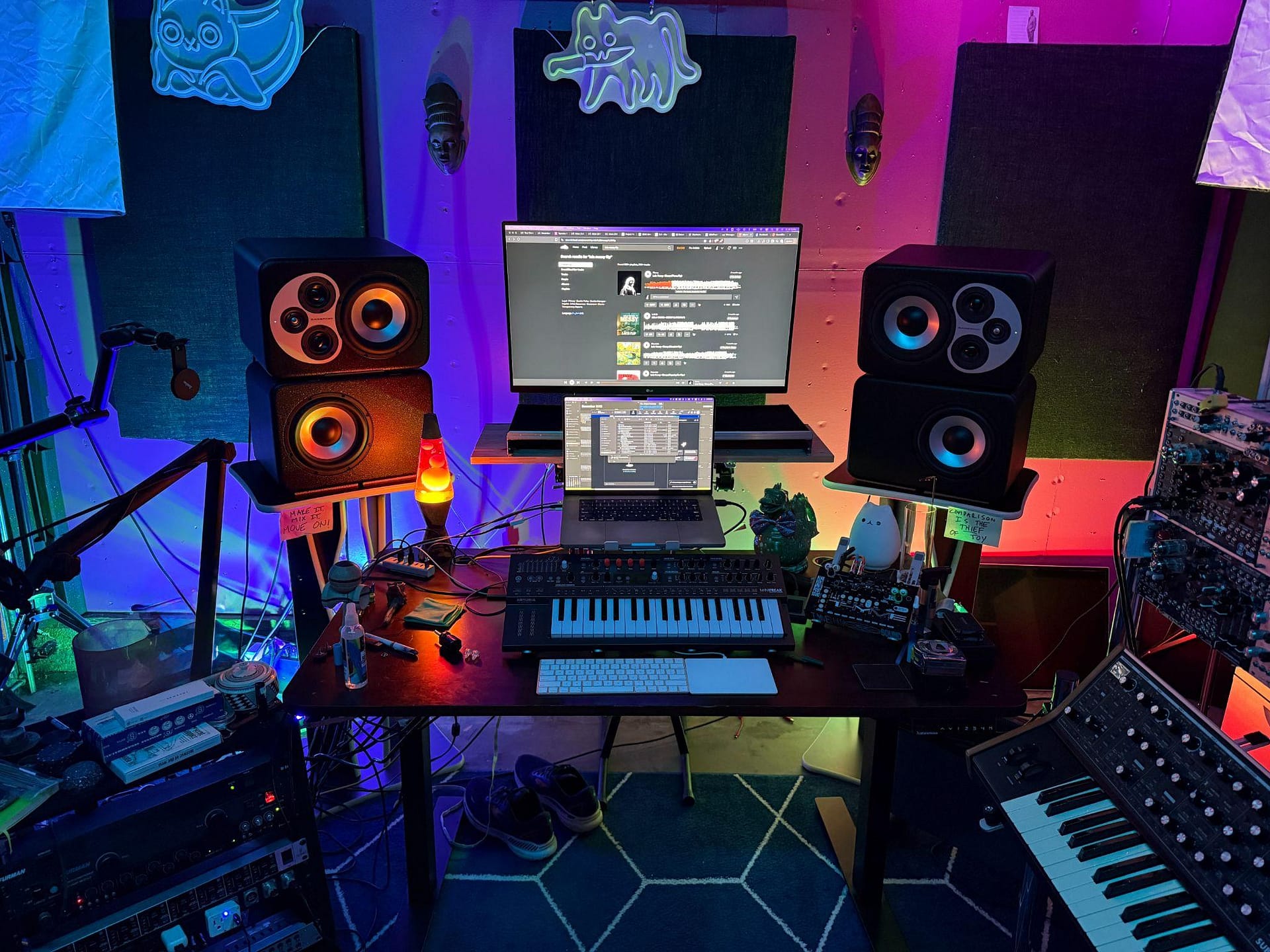 AudioWorkstation A photo of a home music production studio.